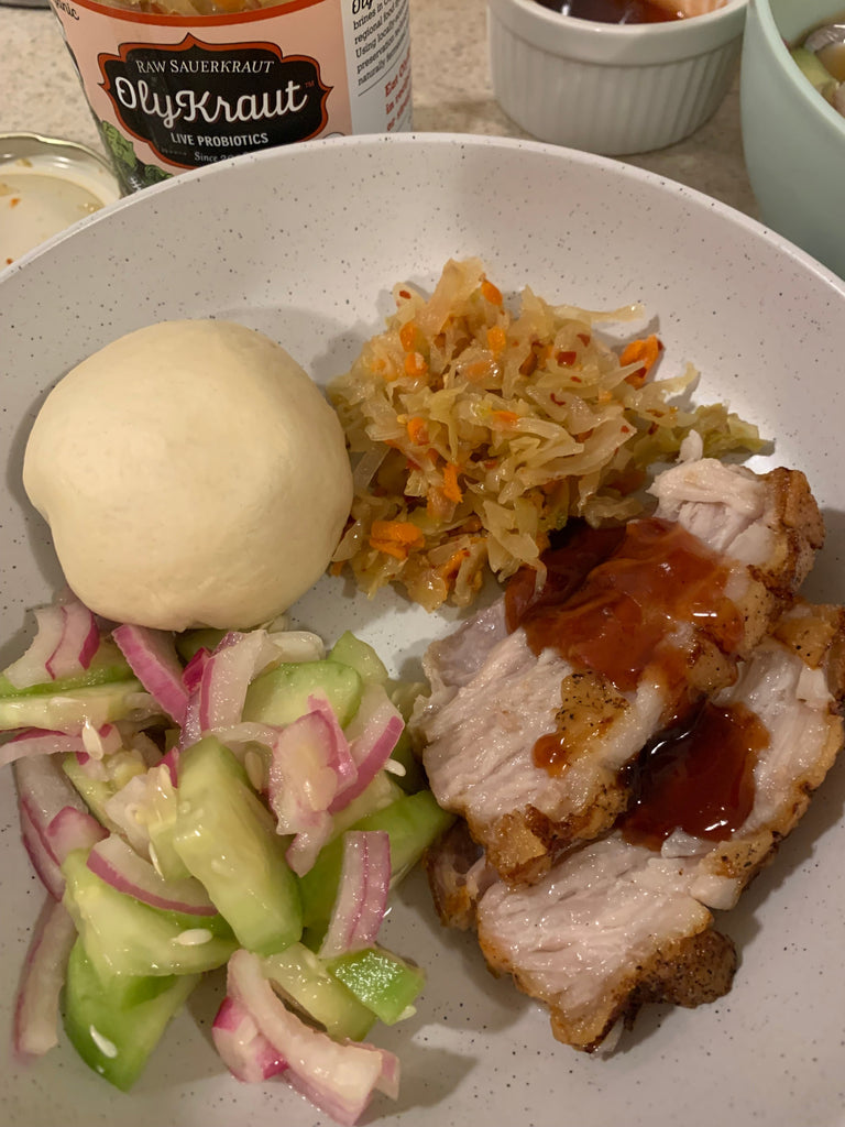 Roasted Pork Belly with Steam Buns, Brine Pickles, and Spicy Garlic Kraut